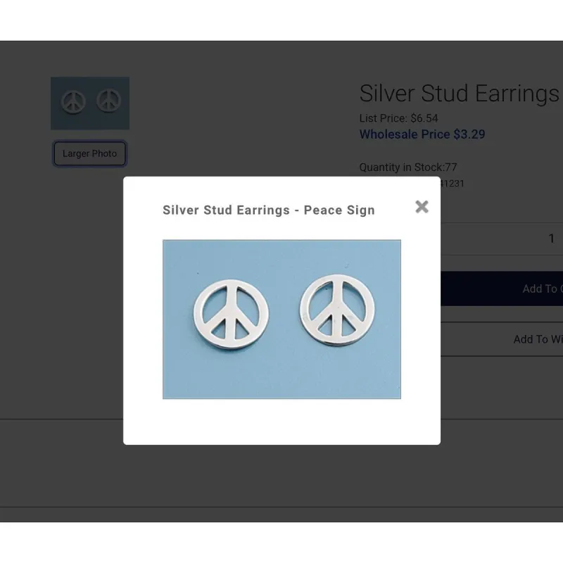 Sterling Silver Circular Peace Sign Stud Earrings sold by Zulily