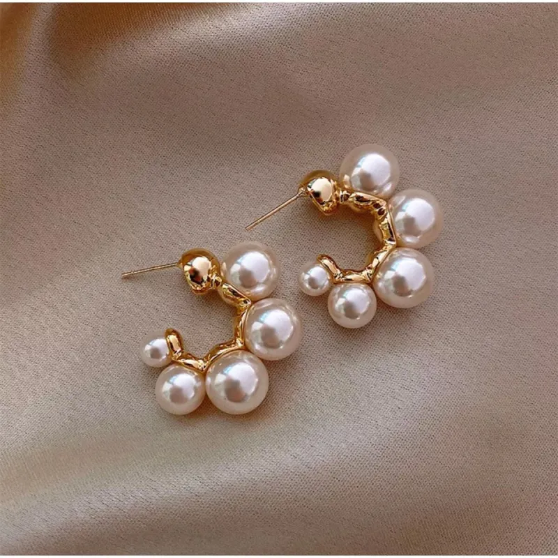 Goldtone & Imitation Pearl Graduated Hoop Earrings sold by Zulily