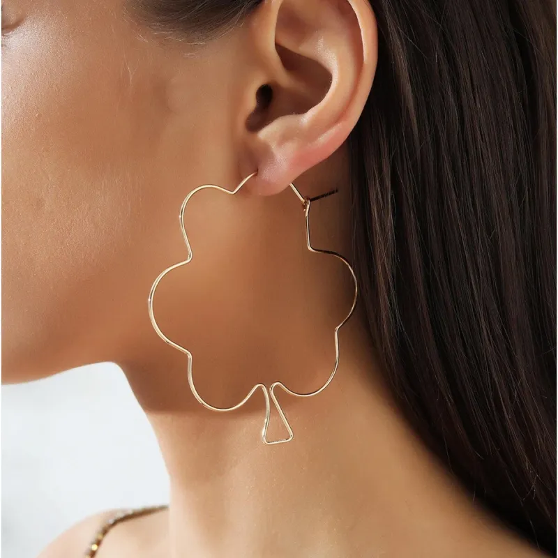 Goldtone Open Shamrock Hoop Earrings sold by Zulily