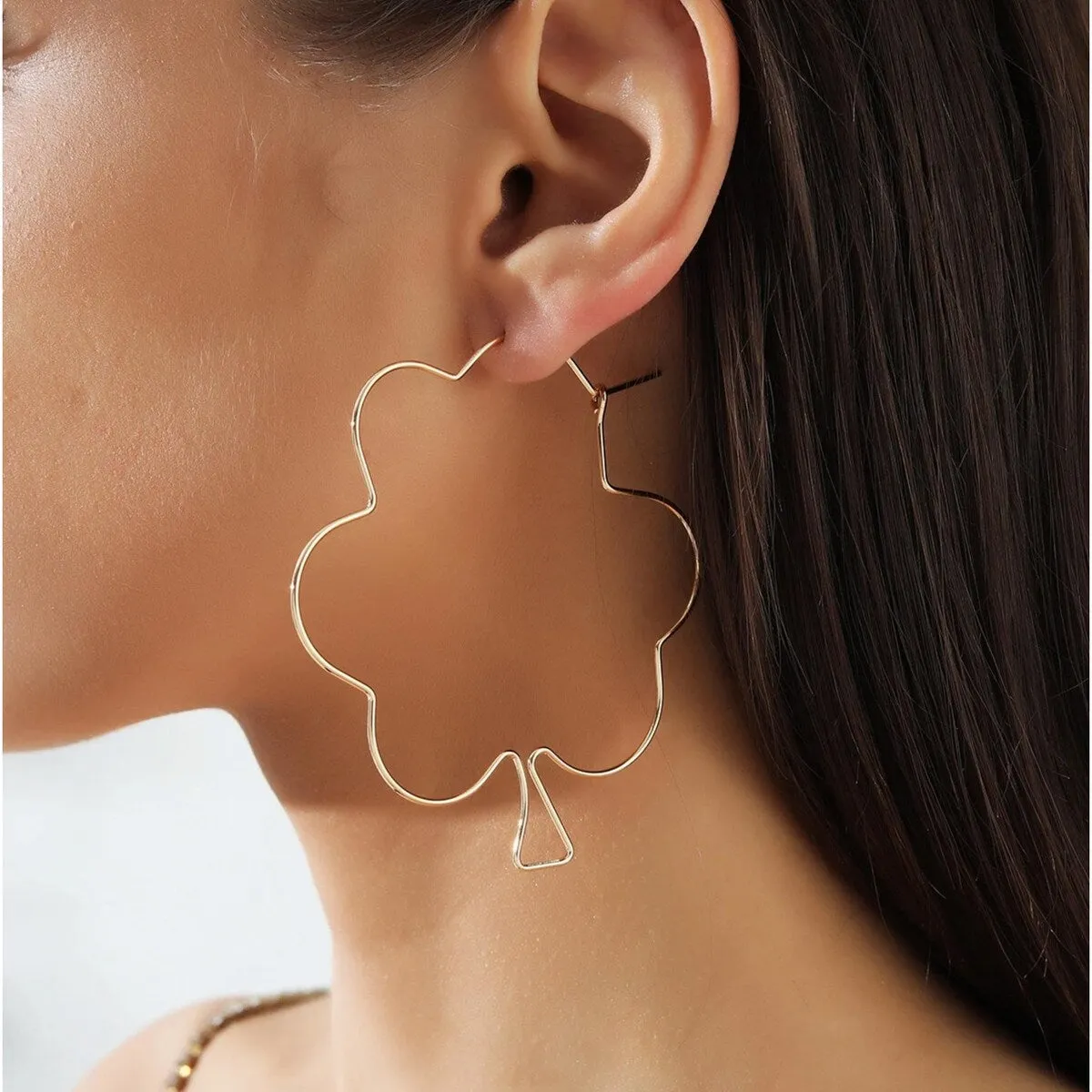 Goldtone Open Shamrock Hoop Earrings sold by Zulily