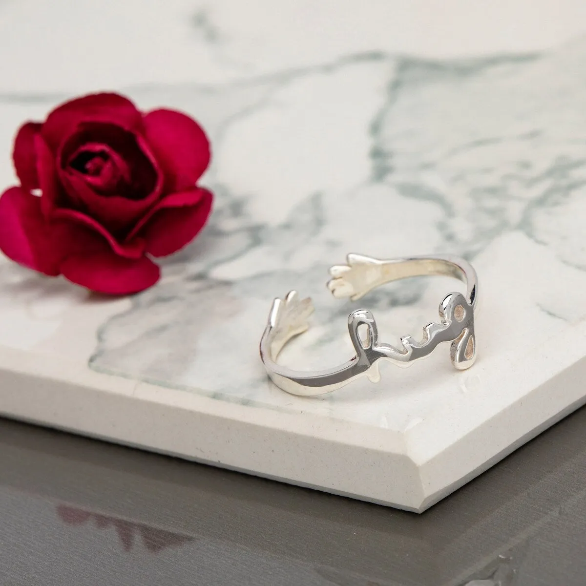 Sterling Silver Hug Adjustable Ring sold by Zulily