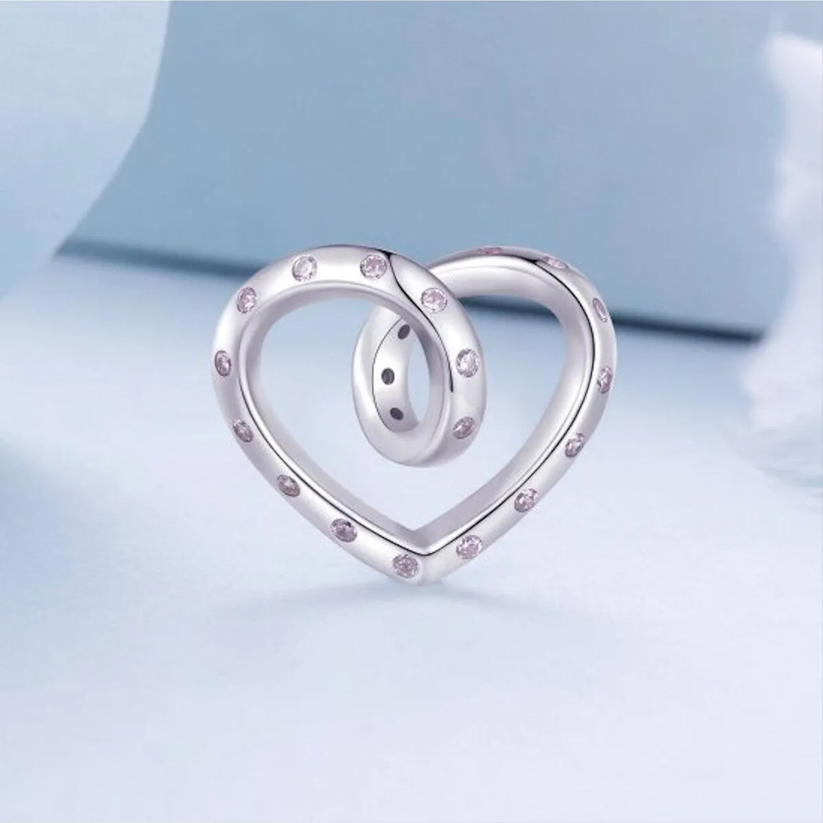 Sterling Silver & Pale Pink CZ Open Twisted Heart Bracelet Charm sold by Zulily product image thumbnail 2