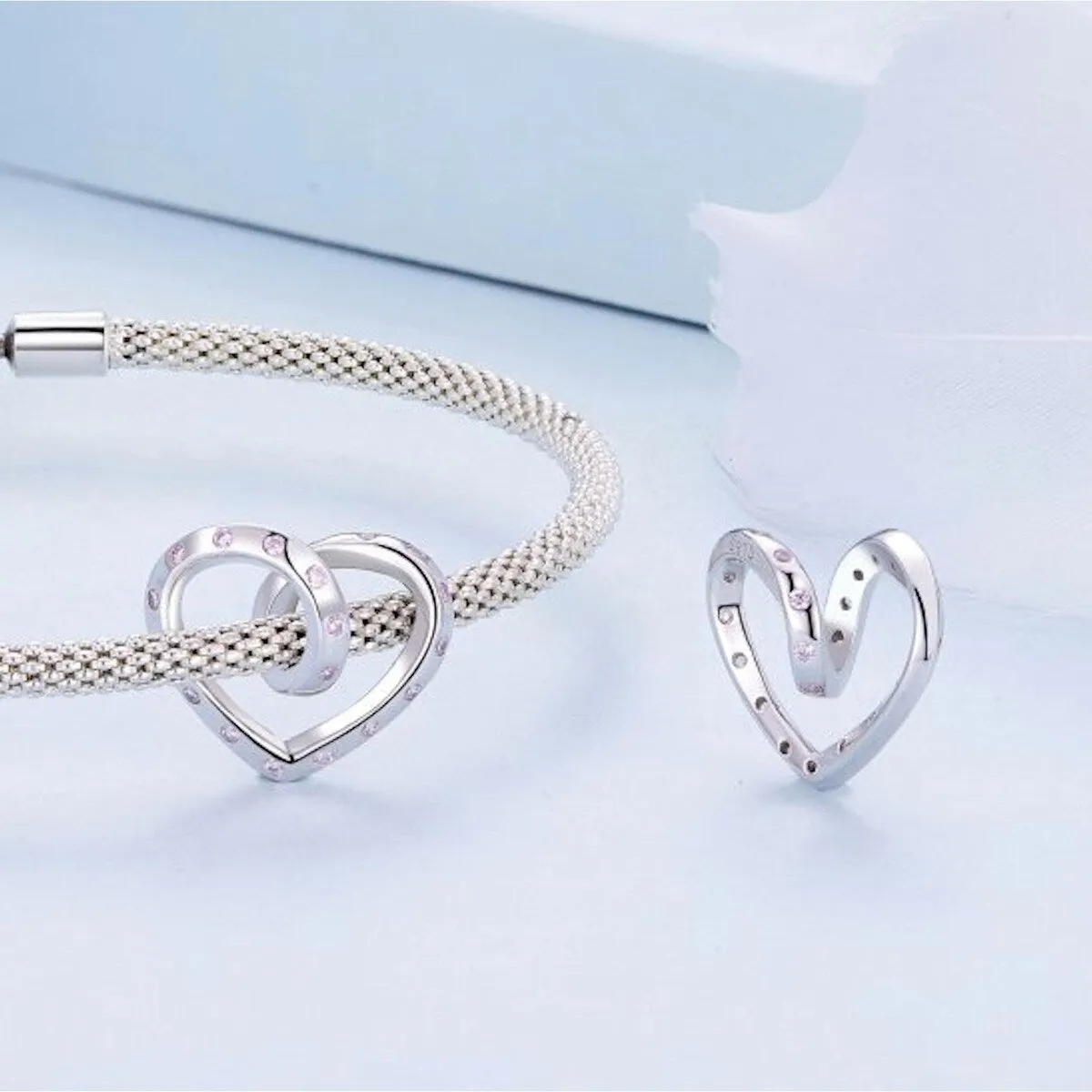 Sterling Silver & Pale Pink CZ Open Twisted Heart Bracelet Charm sold by Zulily product image thumbnail 3