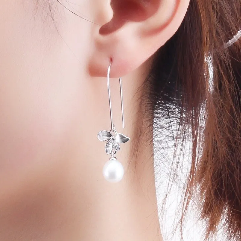 Sterling Silver White Freshwater Pearl Flower Threader Drop Earrings sold by Zulily