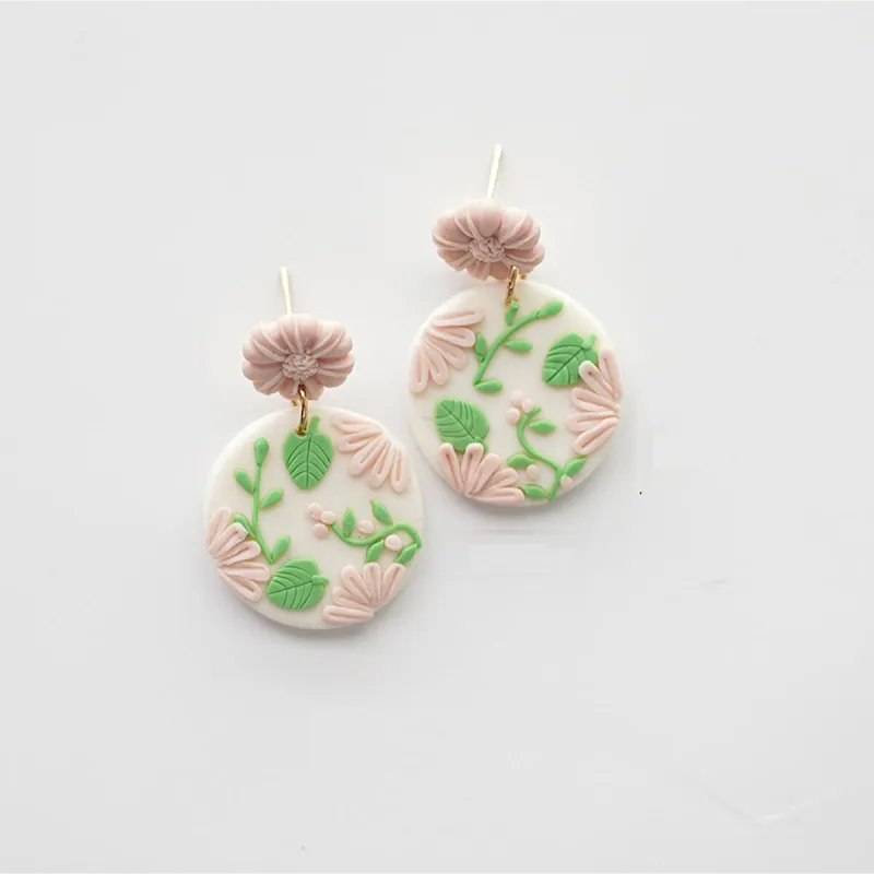 Pale Pink Floral & Greenery Circular Clay Drop Earrings sold by Zulily