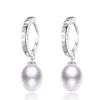 Sterling Silver Cubic Zirconia Huggie Hoop And White Freshwater Pearl Earrings sold by Zulily