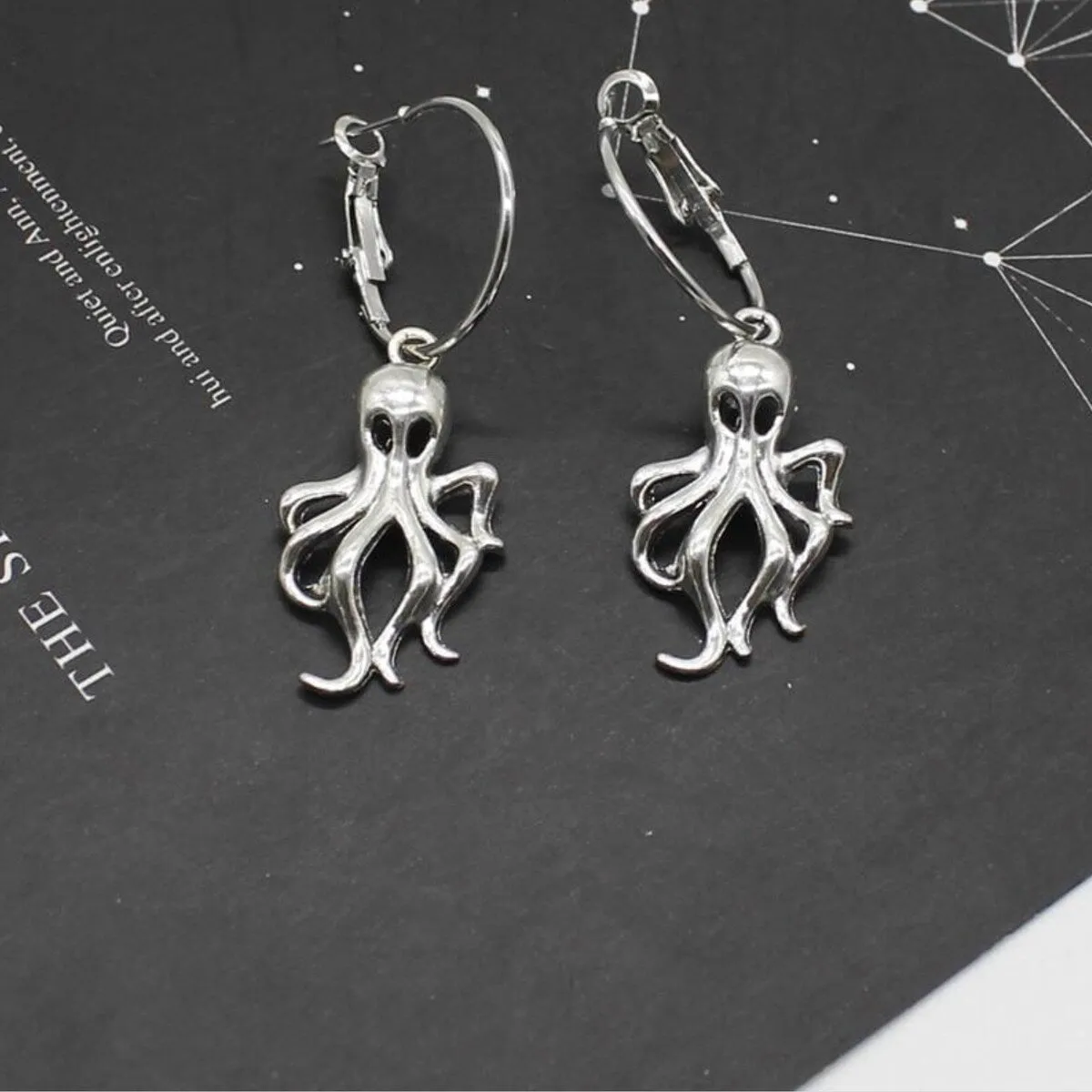 Silvertone Octopus Hoop Earrings sold by Zulily