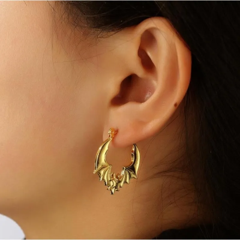 Goldtone Bat Hoop Earrings sold by Zulily