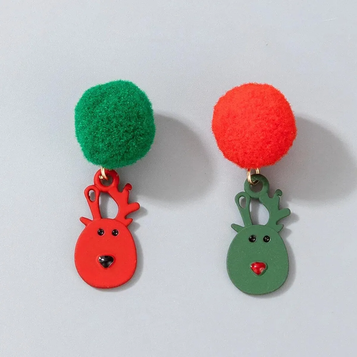 Red & Green Asymmetrical Pom Pom Reindeer Drop Earrings sold by Zulily