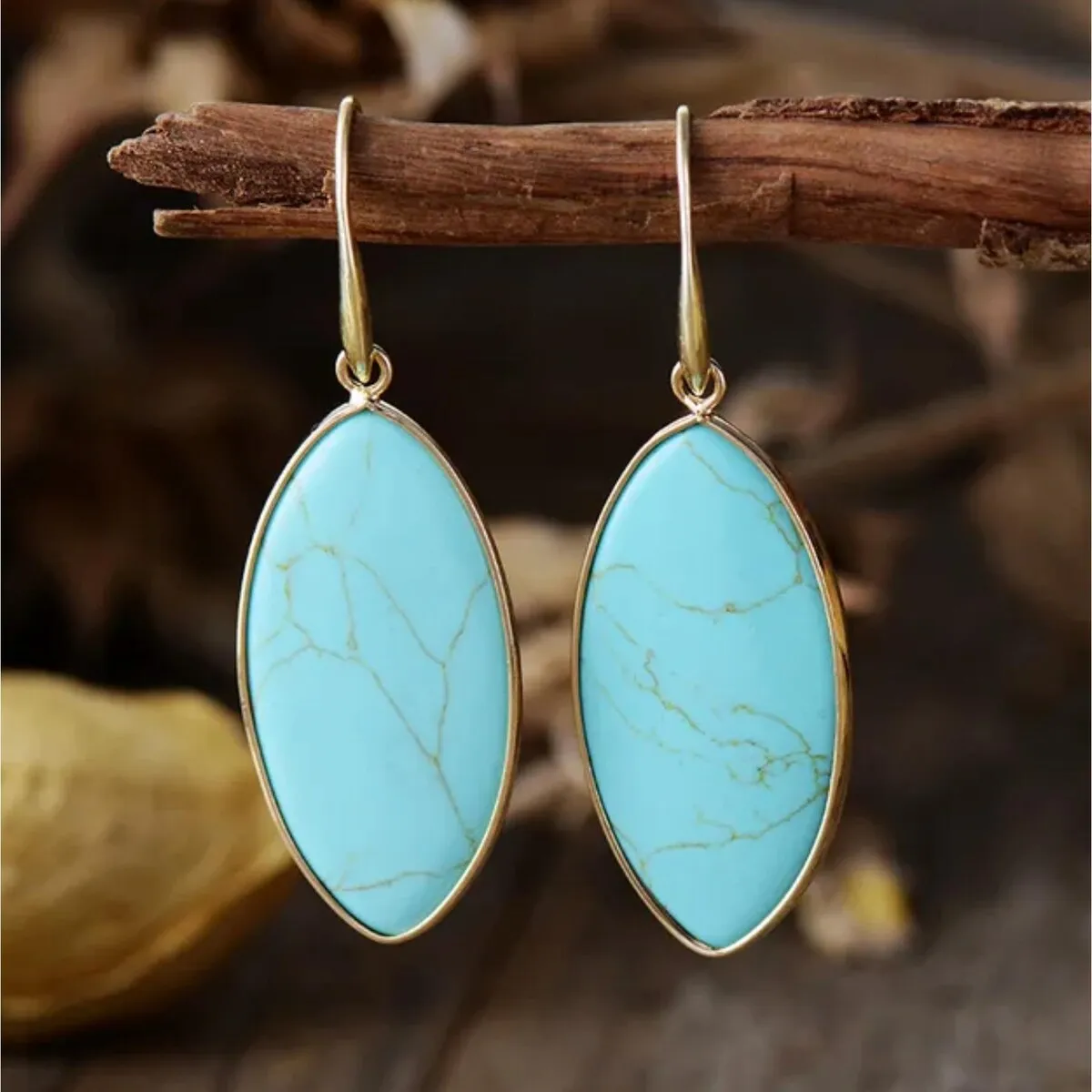 Goldtone & Turquoise Marquis Drop Earrings sold by Zulily