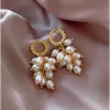 Goldtone Clustered Faux Pearl Drop Earrings sold by Zulily