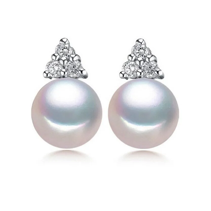 White Freshwater Pearl Stud Earrings With Triangle Cubic Zirconia sold by Zulily