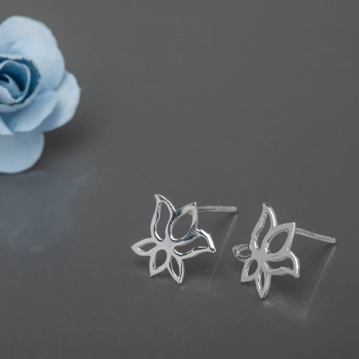 Sterling Silver Open Lotus Stud Earrings sold by Zulily