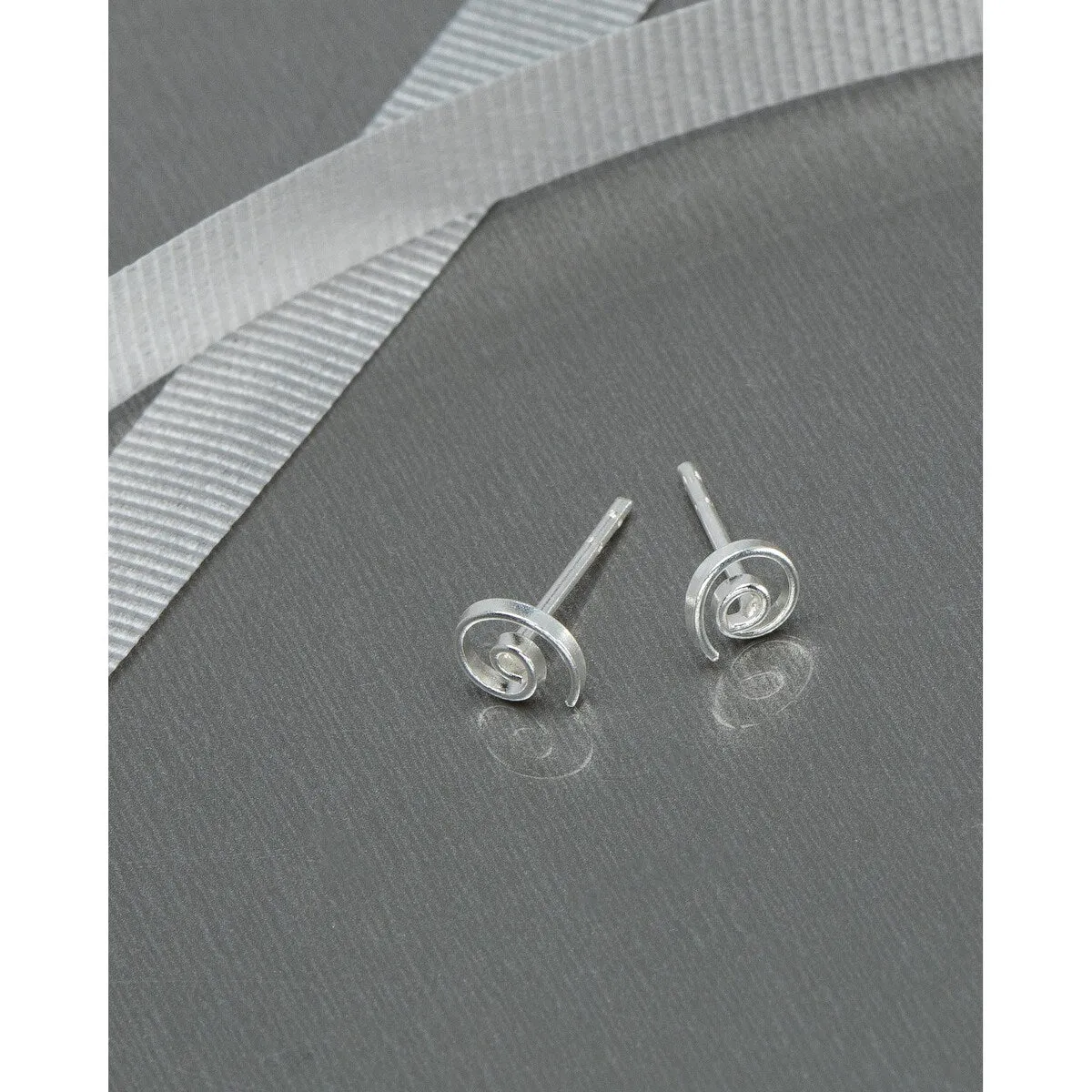 Sterling Silver Loose Spiral Stud Earrings sold by Zulily
