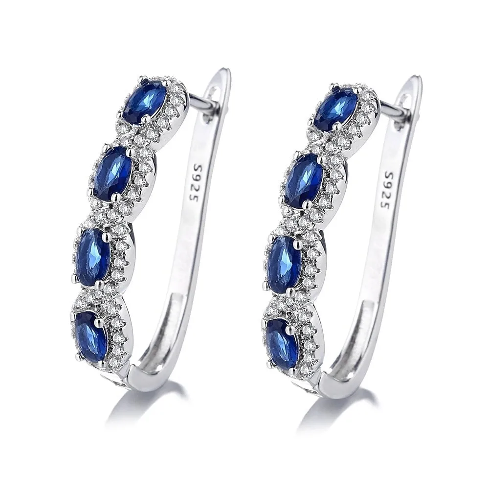 Blue & White Sapphire Halo Earrings in 14k White Gold sold by Zulily