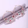 Rose Goldtone Pink Roses Hoop Earrings sold by Zulily