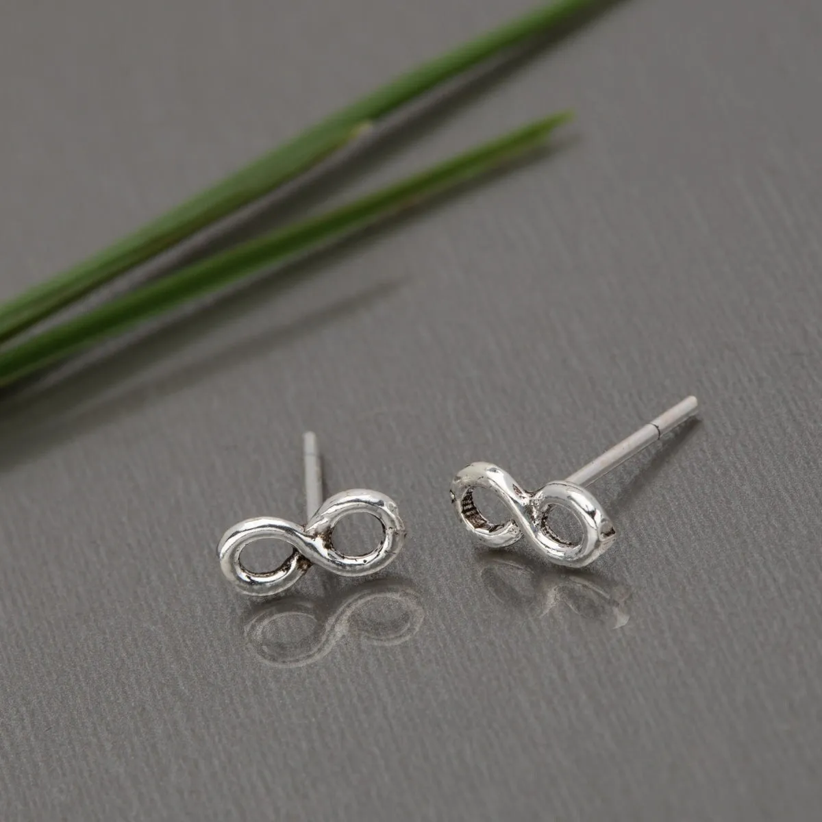 Sterling Silver Infinity Stud Earrings sold by Zulily