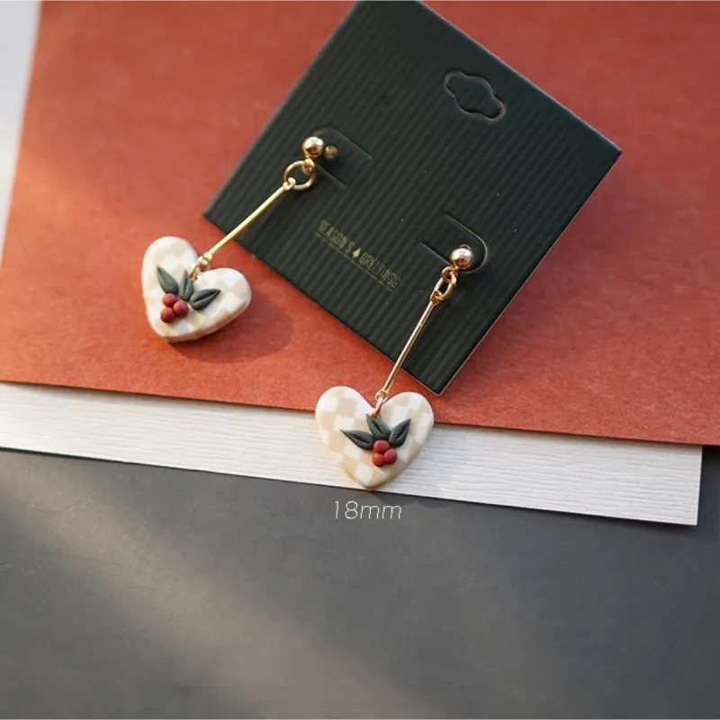 Goldtone Clay Heart Holly Drop Earrings sold by Zulily