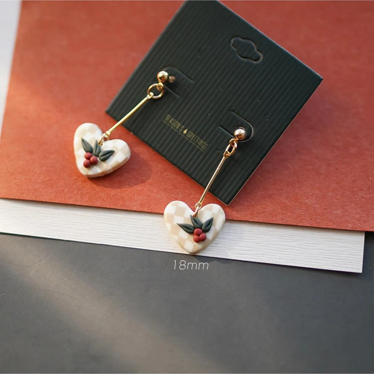 Goldtone Clay Heart Holly Drop Earrings sold by Zulily