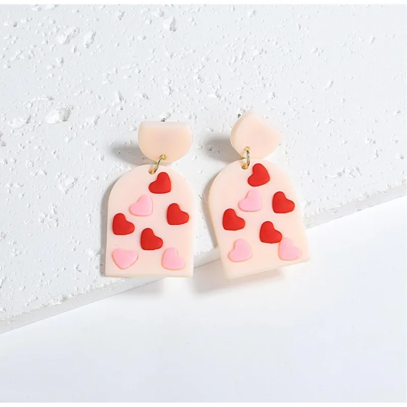 Pink & Red Arched Hearts Drop Earrings sold by Zulily