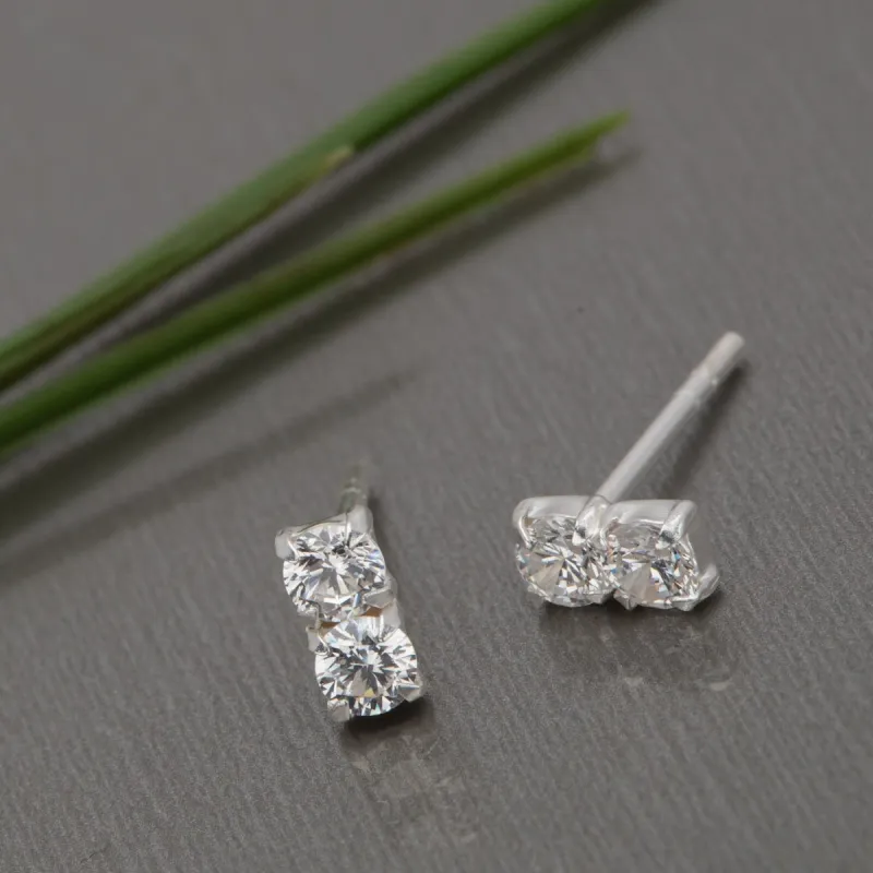 Sterling Silver Dual Circular Crystal Stud Earrings sold by Zulily