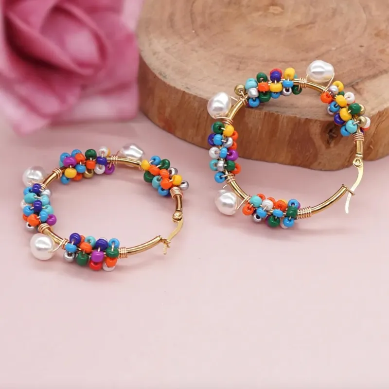 Pearl And Seed Bead Wrapped Hoop In Gold sold by Zulily