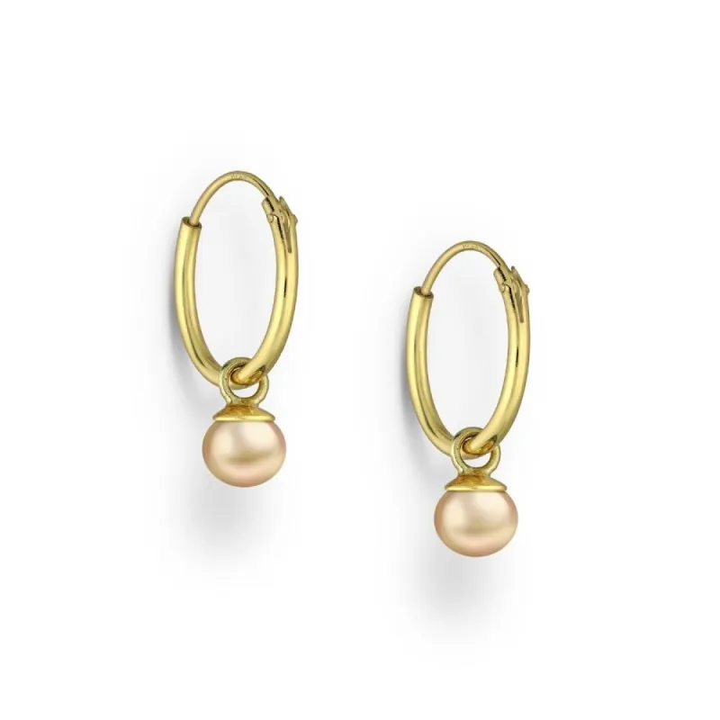 Gold Plated Sterling Silver Huggie Hoop Earrings with Peach Freshwater Pearl sold by Zulily