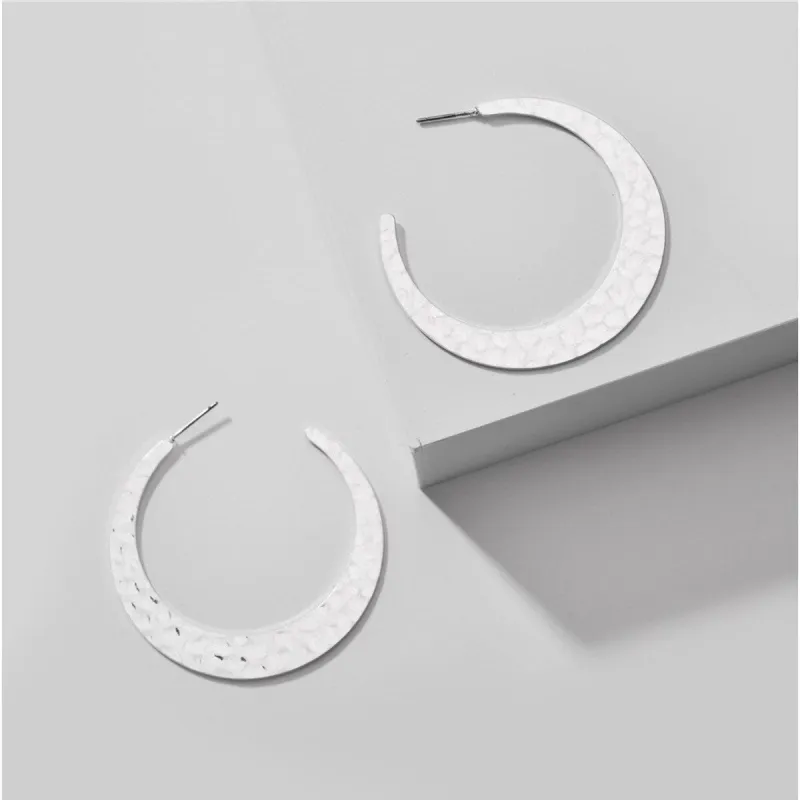 Silvertone Hammered Hoop Earrings sold by Zulily