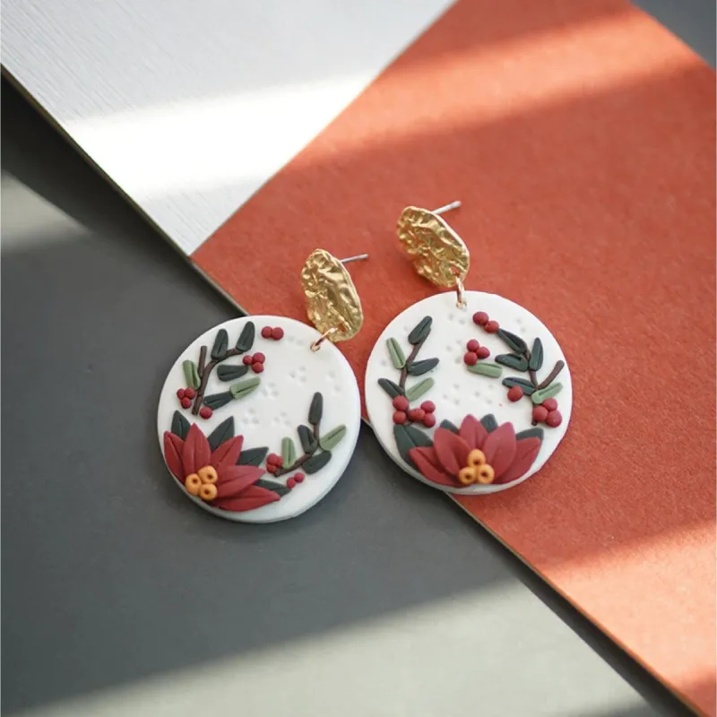 Goldtone & White Circular Earrings With Red Flower sold by Zulily