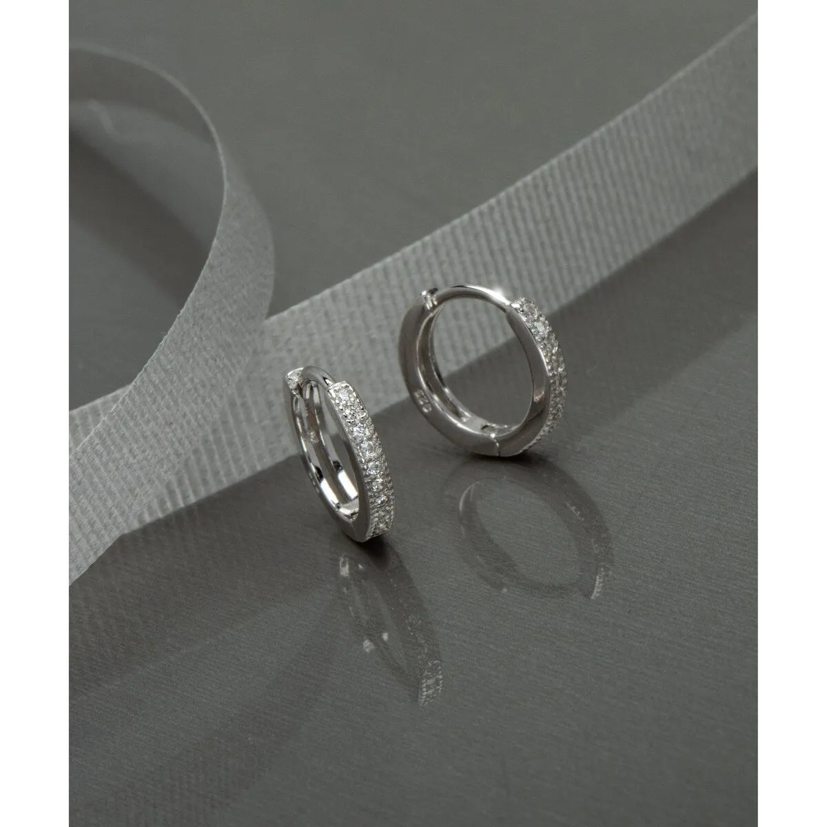 Sterling Silver Cubic Zirconia Mini Huggie Hoop Earrings sold by Zulily product image thumbnail 2