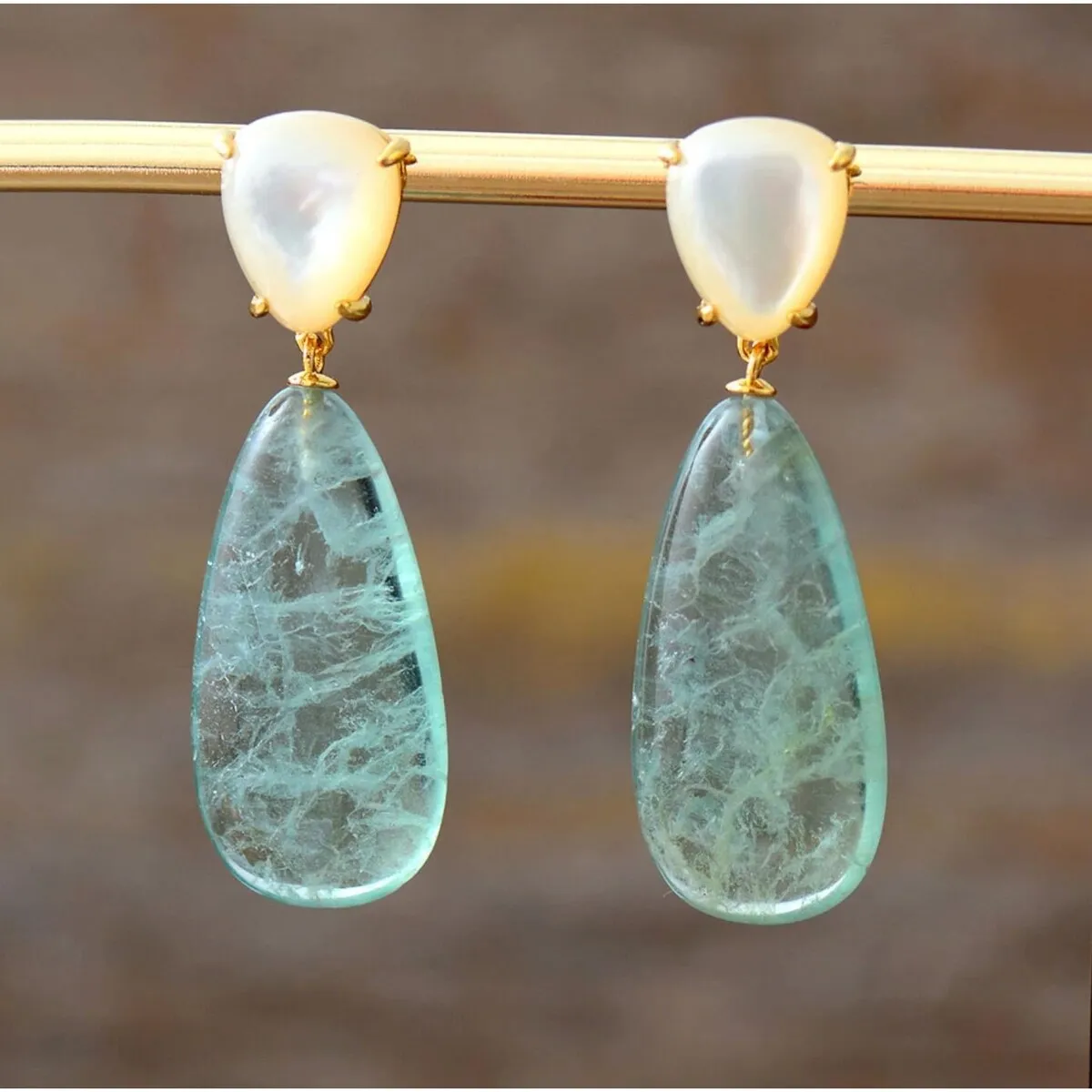Mother of Pearl & Goldtone Clear Long Drop Earrings sold by Zulily