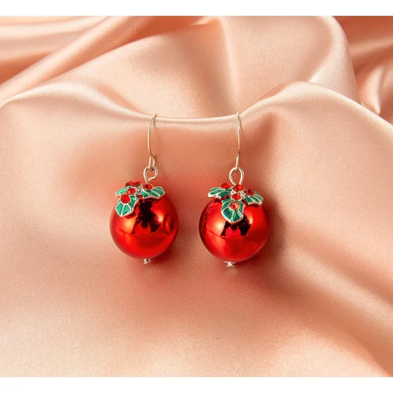 Red Christmas Ornament & Holly Drop Earrings sold by Zulily
