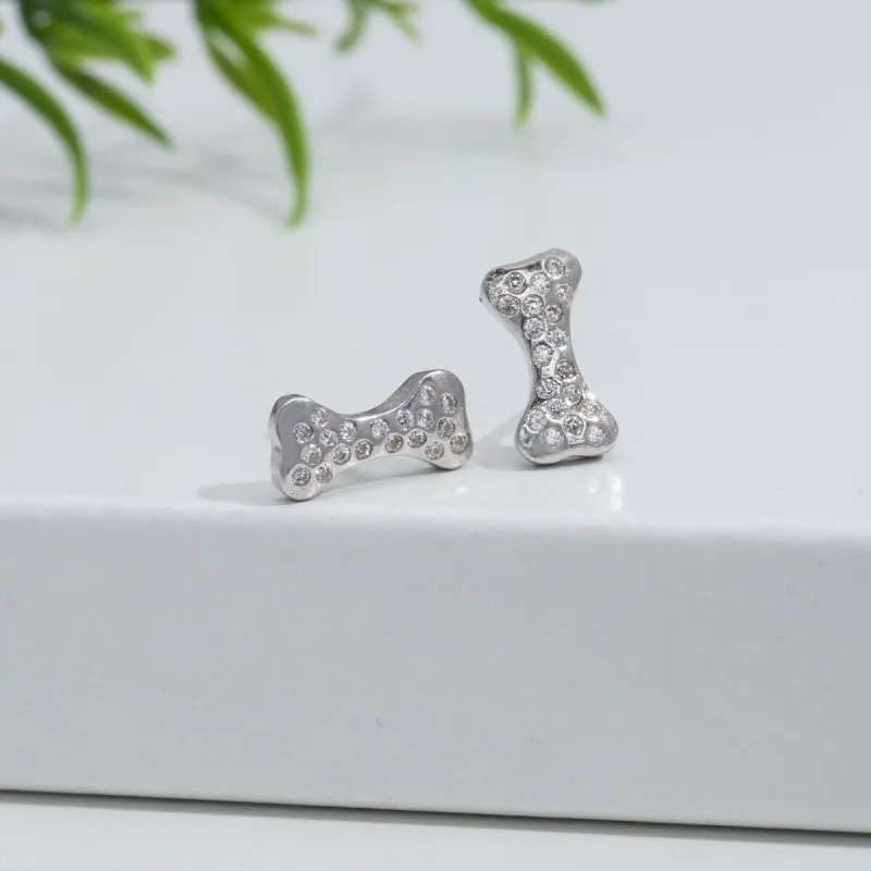 Sterling Silver Cubic Zirconia Dog Bone Stud Earrings sold by Zulily