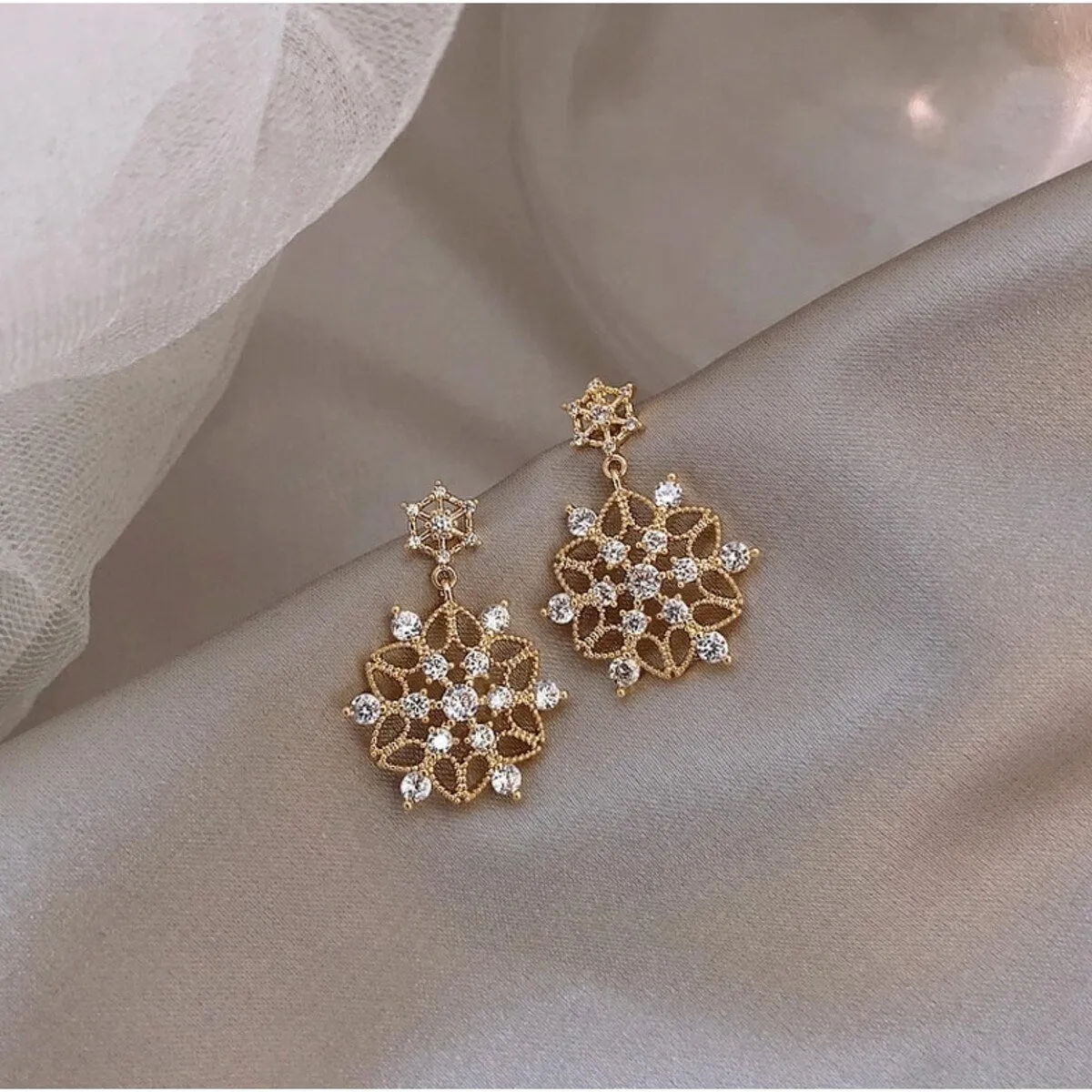 Goldtone & Cz Crystal Ornate Snowflake Drop Earrings sold by Zulily