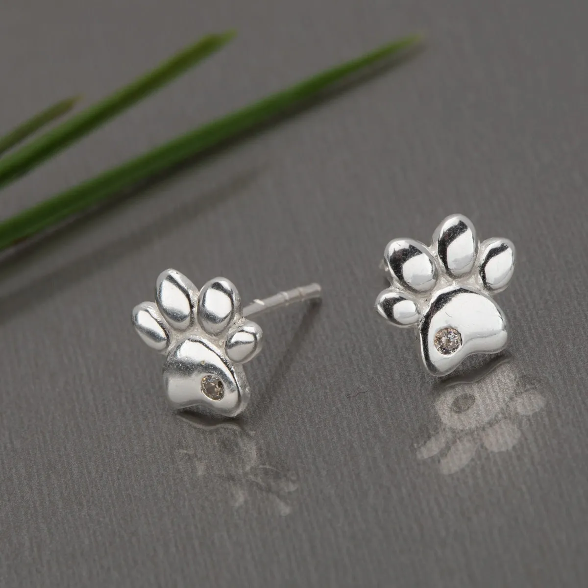 Sterling Silver Cubic Zirconia Paw Print Stud Earrings sold by Zulily