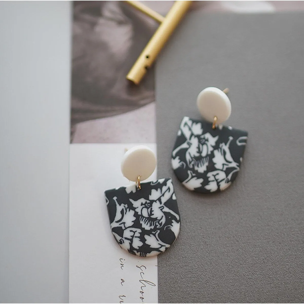 Black & White Floral Arched Drop Earrings sold by Zulily product image thumbnail 3