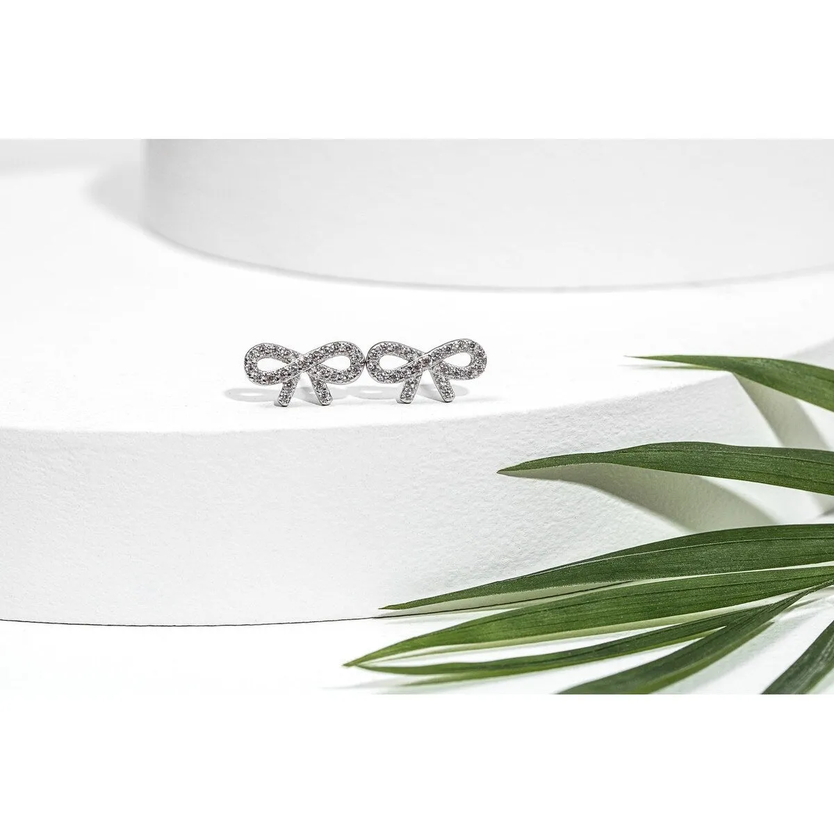 Sterling Silver & Cubic Zirconia Bow Stud Earrings sold by Zulily product image thumbnail 2