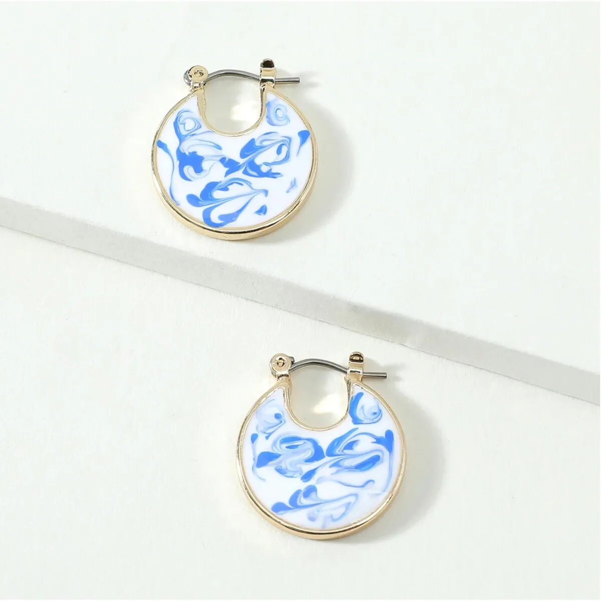 Goldtone White & Blue Marbled Circular Earrings sold by Zulily product image thumbnail 2