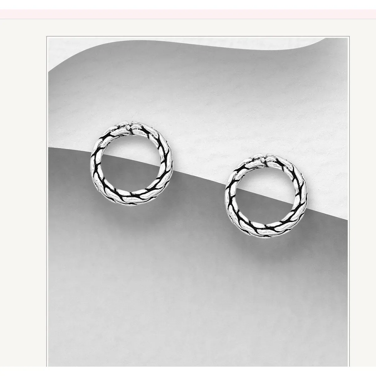 Sterling Silver Woven Open Circle Stud Earrings sold by Zulily