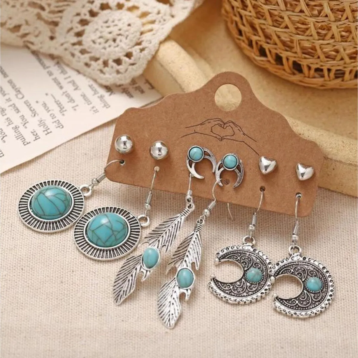 Silveronte & Turquoise Boho Feather And Moon Earring Set sold by Zulily