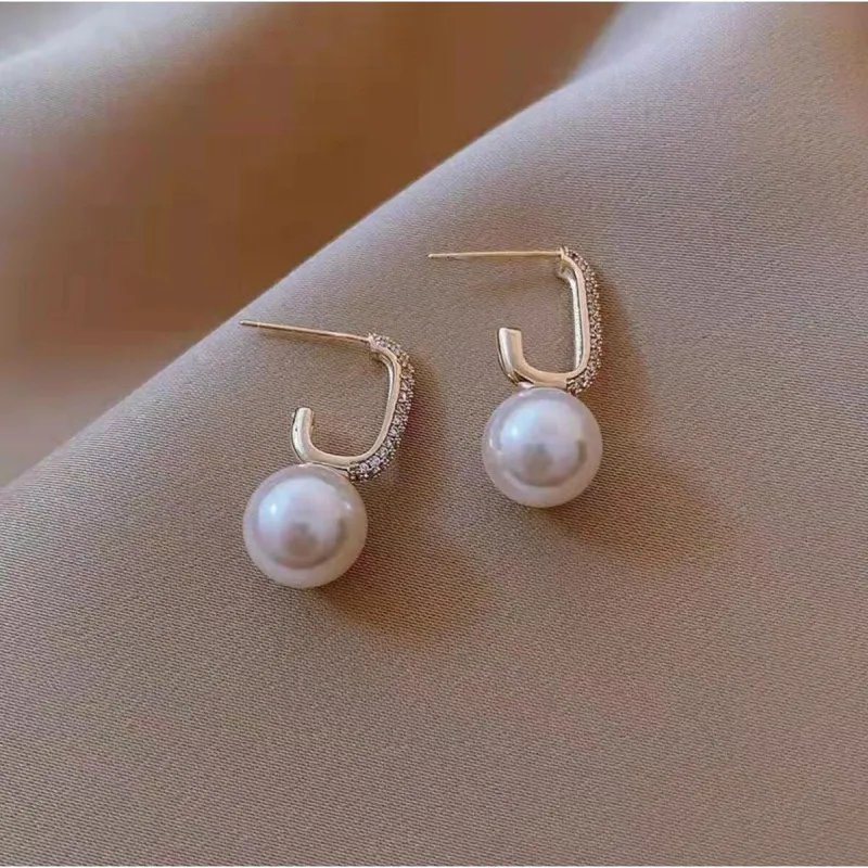 Imitation Pearl & Crystal Pave Earrings sold by Zulily