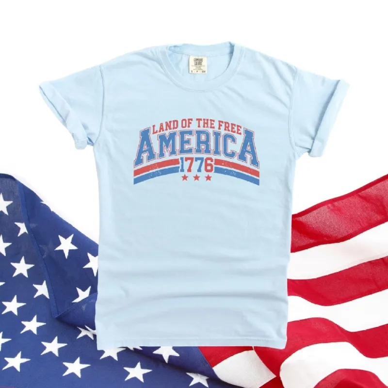 Land of the Free America Curved Garment Dyed Tee sold by Zulily