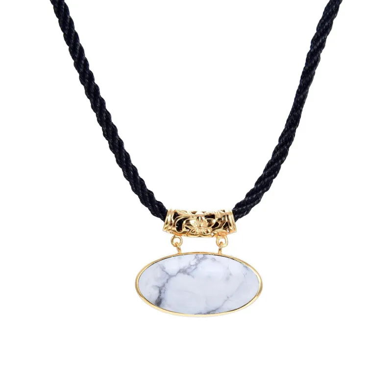 Gold Over Sterling Silver Howlite Pendant with 18" Black Cord and 2" Extension sold by Zulily