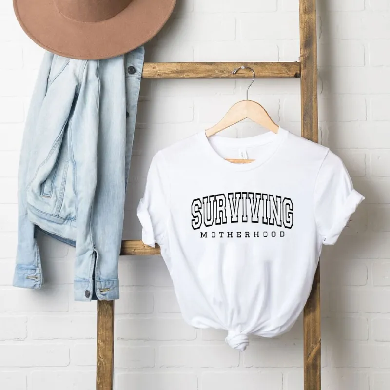 Varsity Surviving Motherhood Short Sleeve Crewnneck Tee sold by Zulily