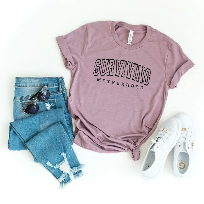 Varsity Surviving Motherhood Short Sleeve Crewnneck Tee sold by Zulily
