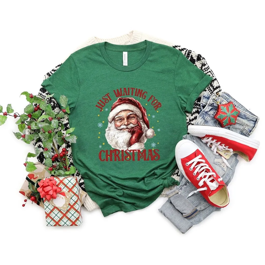 Just Waiting For Christmas Santa Short Sleeve Crewnneck Tee sold by Zulily