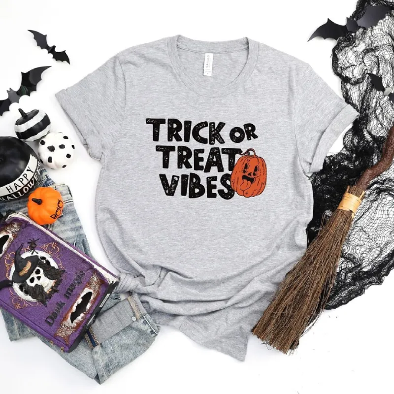 Trick or Treat Vibes Pumpkin Short Sleeve Tee sold by Zulily