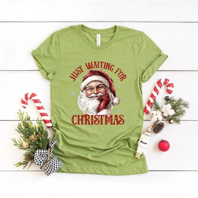 Just Waiting For Christmas Santa Short Sleeve Crewnneck Tee sold by Zulily