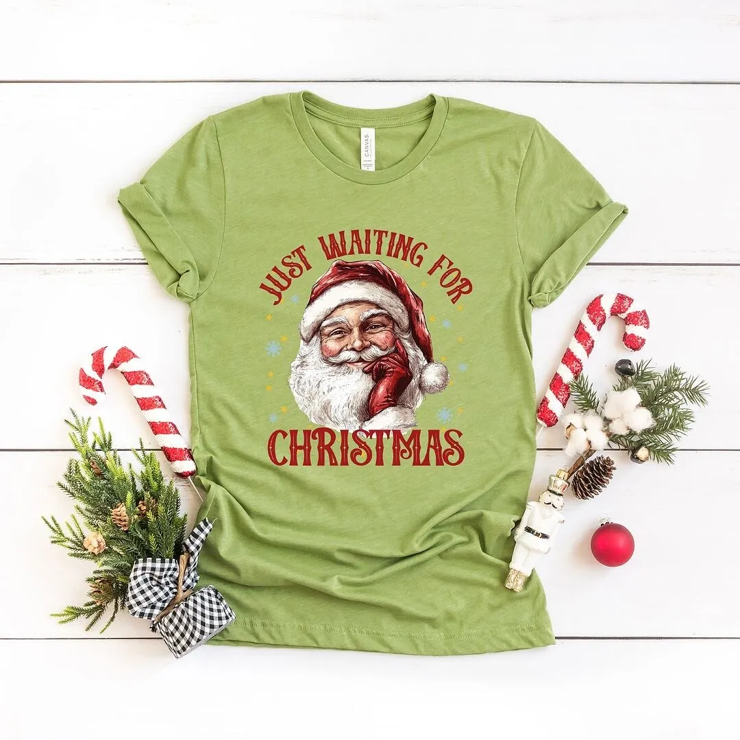 Just Waiting For Christmas Santa Short Sleeve Crewnneck Tee sold by Zulily