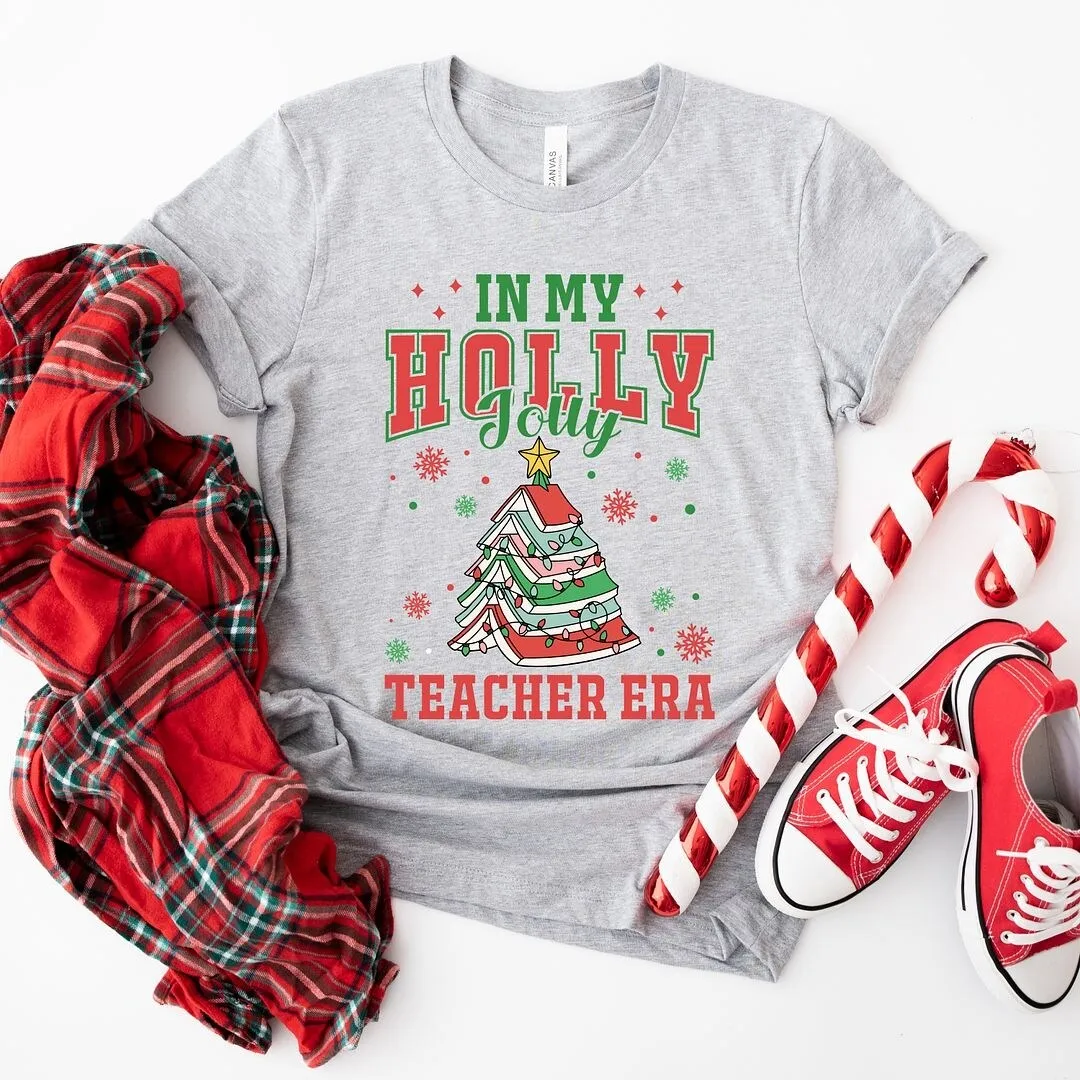 Holly Jolly Teacher Era Short Sleeve Crewnneck Tee sold by Zulily